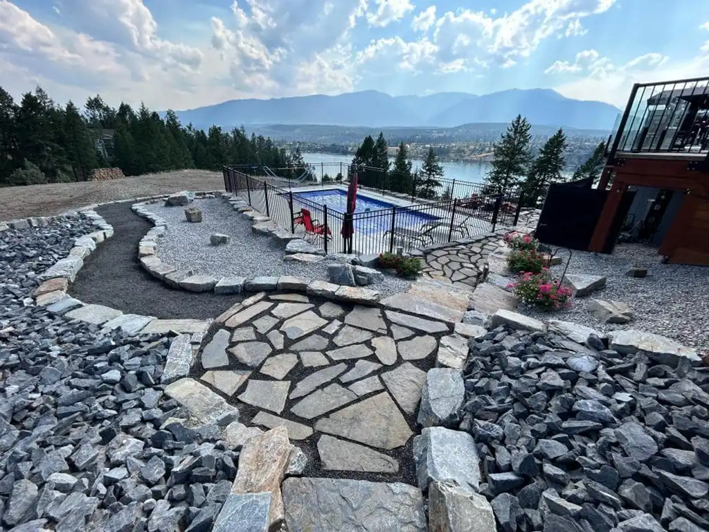 stonework by a pool done by Vision Project Services