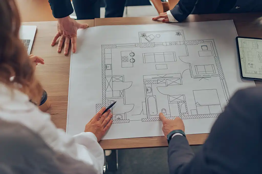 people looking at home plans